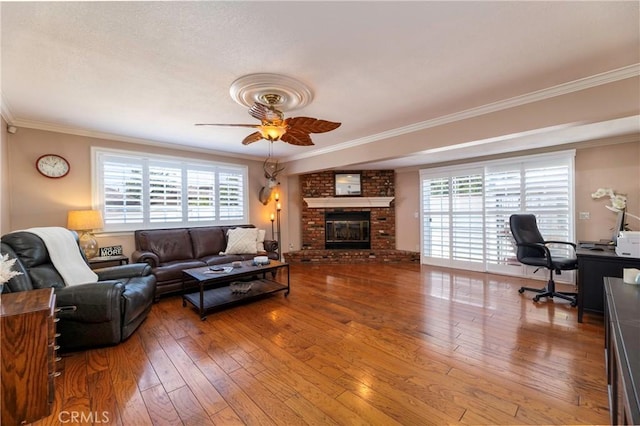 14913 San Ardo Dr, La Mirada, CA 90638 - living room with ceiling fan, crown molding, wood-type flooring, plenty of natural light, and a fireplace