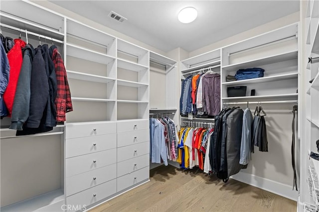 129 Pathway, Irvine, CA 92618 - walk in closet with wood finished floors