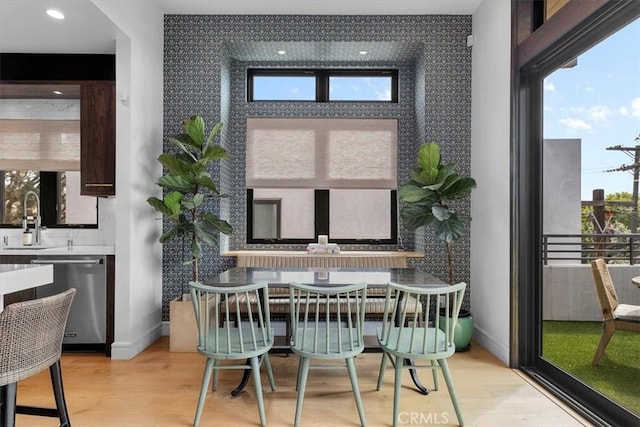 802 Bard St, Hermosa Beach, CA 90254 - dining room with an accent wall, light wood-style floors, and wallpapered walls