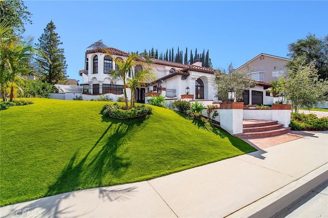 29614 Ridgeway Dr, Agoura Hills, CA 91301 - mediterranean / spanish-style home with a front yard, stucco siding, and a tile roof