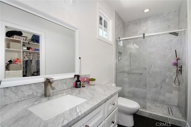 29614 Ridgeway Dr, Agoura Hills, CA 91301 - bathroom featuring vanity, a stall shower, a spacious closet, recessed lighting, and tile patterned flooring