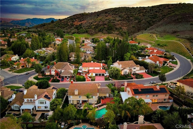29614 Ridgeway Dr, Agoura Hills, CA 91301 - aerial perspective of suburban area featuring a mountainous background and a pool area