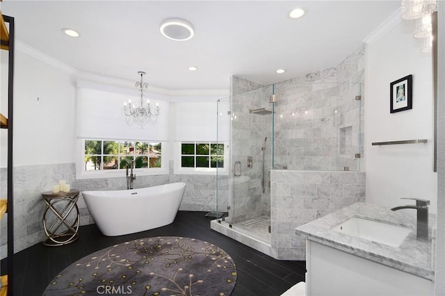 29614 Ridgeway Dr, Agoura Hills, CA 91301 - full bath featuring tile walls, crown molding, a freestanding tub, vanity, and a stall shower