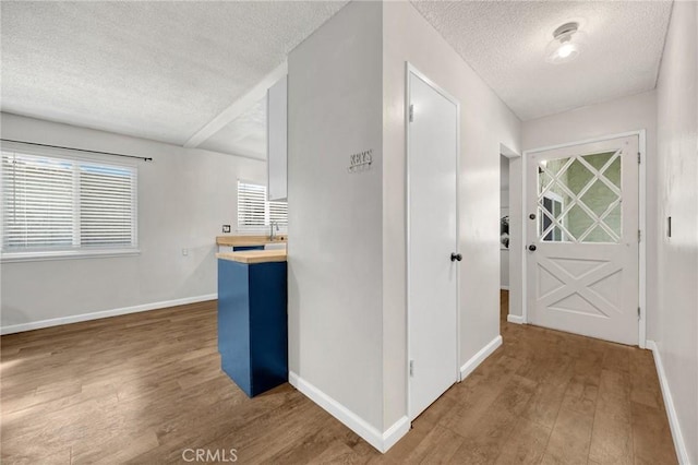 350 E Olive Ave, La Habra, CA 90631 - hall with a textured ceiling and wood finished floors