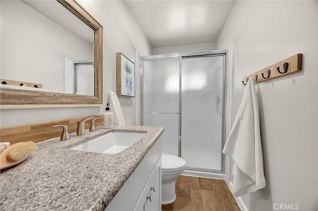 350 E Olive Ave, La Habra, CA 90631 - full bathroom with vanity, wood finished floors, and a stall shower