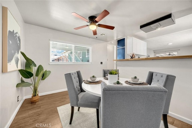 350 E Olive Ave, La Habra, CA 90631 - dining room with a ceiling fan and wood finished floors
