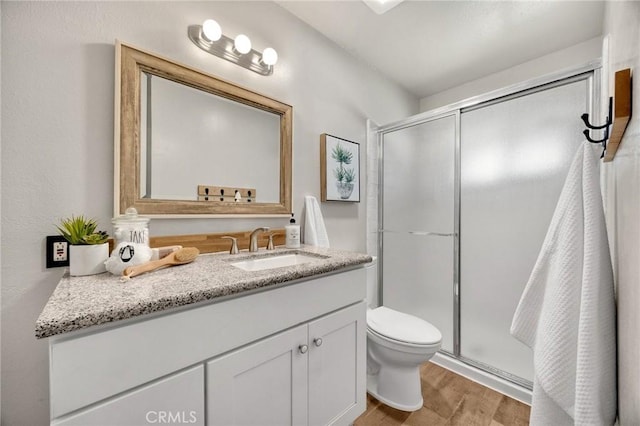 350 E Olive Ave, La Habra, CA 90631 - full bath featuring wood finished floors, vanity, and a stall shower