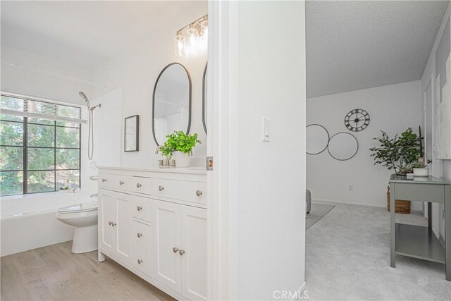 21715 Laurelrim Dr Unit D, Diamond Bar, CA 91765 - full bath featuring vanity, bathing tub / shower combination, and wood finished floors