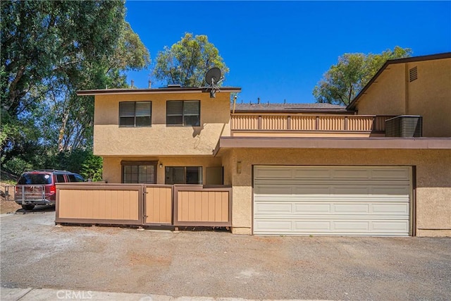 21715 Laurelrim Dr Unit D, Diamond Bar, CA 91765 - view of front of house featuring a balcony, stucco siding, and an attached garage