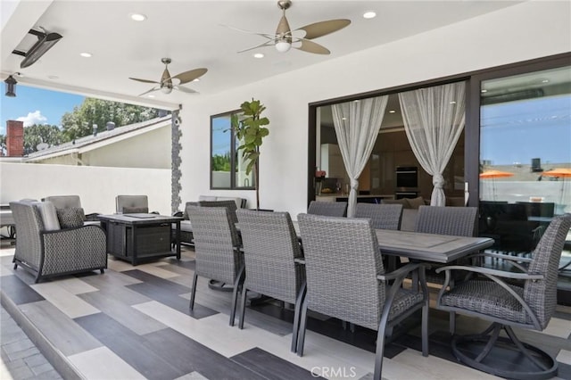 10418 Rubio Ave, Granada Hills, CA 91344 - view of patio with outdoor dining area, ceiling fan, and an outdoor living space