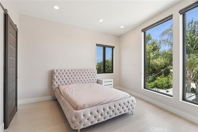 10418 Rubio Ave, Granada Hills, CA 91344 - bedroom featuring light wood-style floors and recessed lighting
