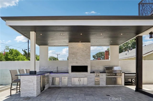 10418 Rubio Ave, Granada Hills, CA 91344 - view of patio / terrace with exterior kitchen