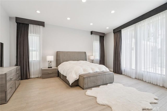 10418 Rubio Ave, Granada Hills, CA 91344 - bedroom with recessed lighting and light wood-style floors