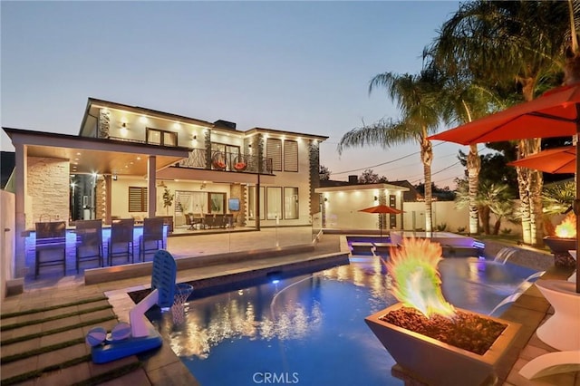 10418 Rubio Ave, Granada Hills, CA 91344 - view of pool with a fire pit and a patio area