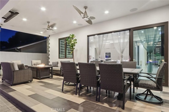 10418 Rubio Ave, Granada Hills, CA 91344 - view of patio / terrace with ceiling fan, an outdoor living space with a fire pit, and outdoor dining space