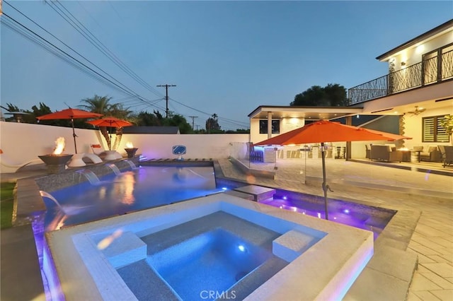 10418 Rubio Ave, Granada Hills, CA 91344 - view of pool with an in-ground hot tub, an outdoor living space, a patio, and a fenced backyard