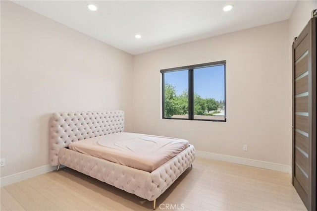 10418 Rubio Ave, Granada Hills, CA 91344 - bedroom featuring light wood finished floors and recessed lighting