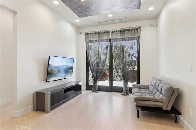 10418 Rubio Ave, Granada Hills, CA 91344 - sitting room with wood finished floors and recessed lighting