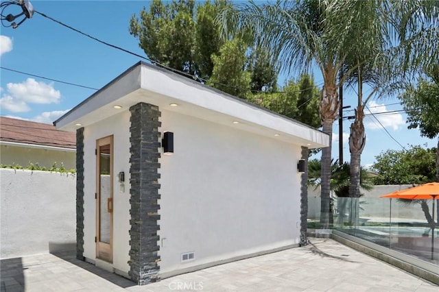 10418 Rubio Ave, Granada Hills, CA 91344 - view of side of property featuring stucco siding