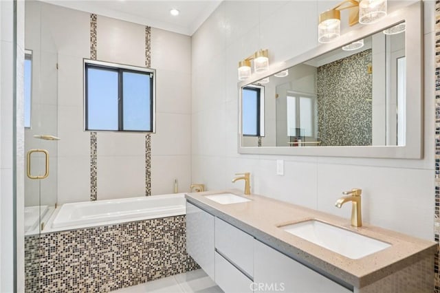 10418 Rubio Ave, Granada Hills, CA 91344 - full bathroom featuring a bath, a shower stall, double vanity, and tile walls