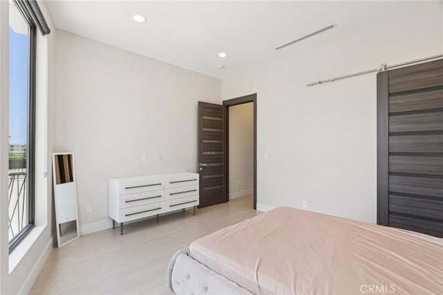 10418 Rubio Ave, Granada Hills, CA 91344 - bedroom featuring recessed lighting and light wood-style flooring