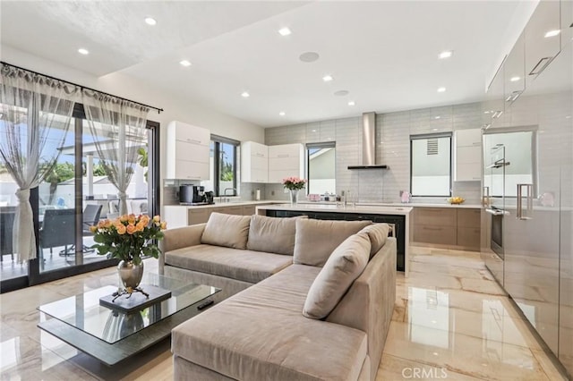 10418 Rubio Ave, Granada Hills, CA 91344 - living area with light marble finish floors and recessed lighting