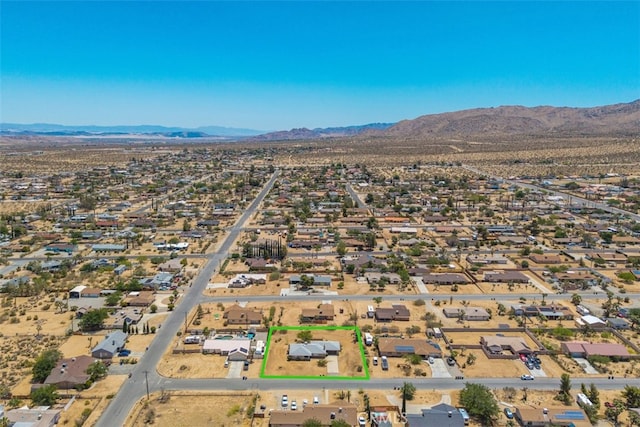 7535 Hilton Ave, Yucca Valley, CA 92284 - aerial overview of property's location with mountains and property boundaries highlighted