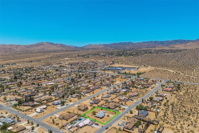 7535 Hilton Ave, Yucca Valley, CA 92284 - aerial view of residential area featuring mountains and property boundaries highlighted