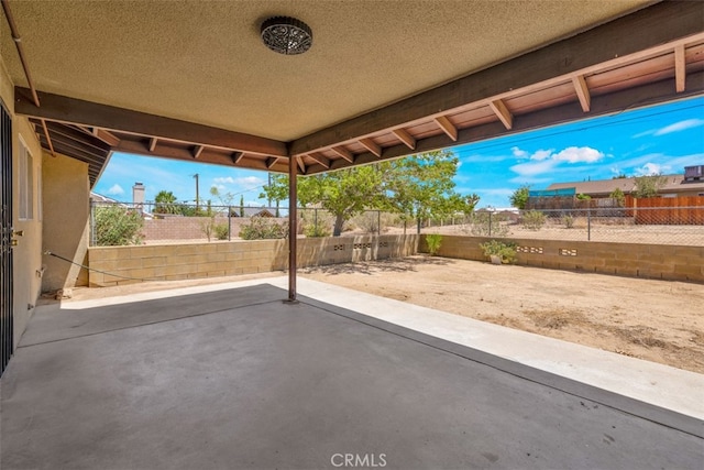7535 Hilton Ave, Yucca Valley, CA 92284 - fenced backyard with a patio area
