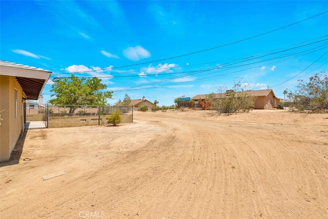 7535 Hilton Ave, Yucca Valley, CA 92284 - view of yard with a gate