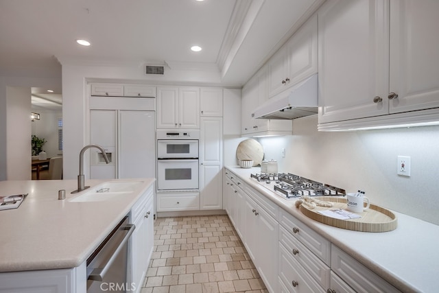 2569 Bungalow Pl, Corona Del Mar, CA 92625 - kitchen featuring stainless steel dishwasher, under cabinet range hood, gas stovetop, double oven, and white cabinetry
