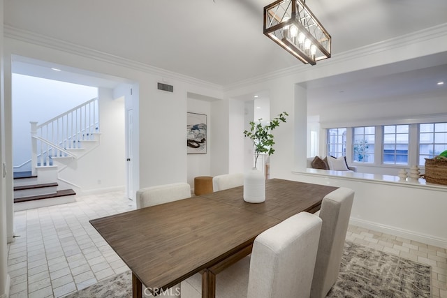 2569 Bungalow Pl, Corona Del Mar, CA 92625 - dining area with ornamental molding, stairway, and a chandelier