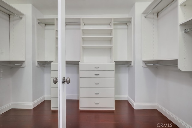 2569 Bungalow Pl, Corona Del Mar, CA 92625 - spacious closet featuring wood finished floors