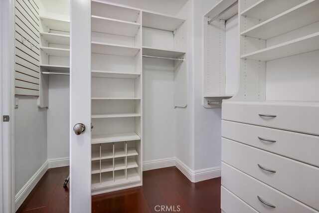 2569 Bungalow Pl, Corona Del Mar, CA 92625 - walk in closet with dark wood-style floors