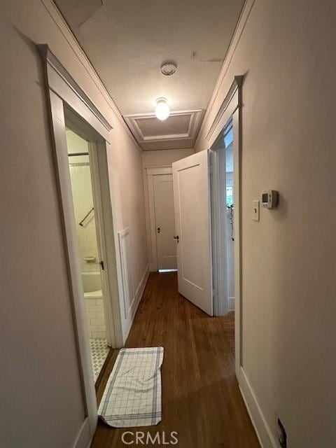 1045 Gladys Ave, Long Beach, CA 90804 - hallway featuring wood finished floors and attic access