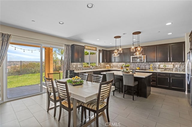 44316 Revana St, Temecula, CA 92592 - dining area featuring light tile patterned floors and recessed lighting