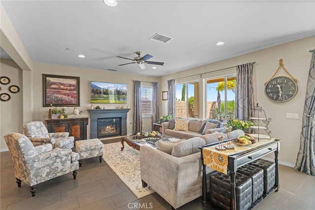 44316 Revana St, Temecula, CA 92592 - living area featuring recessed lighting, ceiling fan, a glass covered fireplace, and light tile patterned floors
