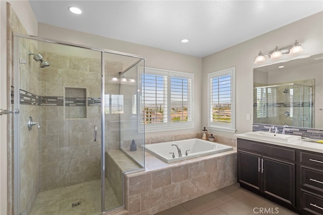 44316 Revana St, Temecula, CA 92592 - full bathroom featuring a garden tub, a stall shower, tile patterned floors, vanity, and recessed lighting