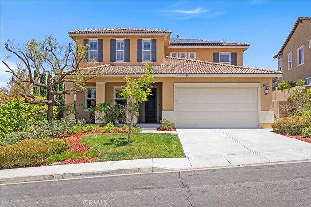 44316 Revana St, Temecula, CA 92592 - mediterranean / spanish house featuring a tile roof, stucco siding, an attached garage, and driveway