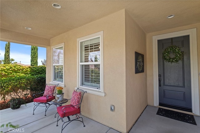44316 Revana St, Temecula, CA 92592 - doorway to property featuring stucco siding
