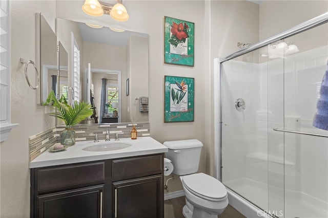 44316 Revana St, Temecula, CA 92592 - bathroom with a shower stall, vanity, and backsplash