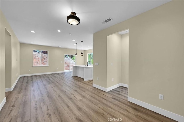 5350 Filbert St, Paradise, CA 95969 - unfurnished living room featuring light wood finished floors and recessed lighting