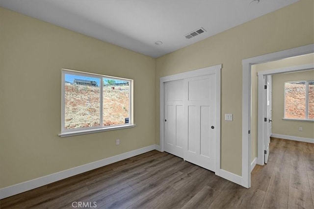 5350 Filbert St, Paradise, CA 95969 - unfurnished bedroom with wood finished floors and a closet