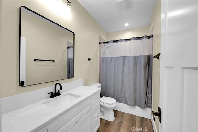 5350 Filbert St, Paradise, CA 95969 - bathroom with vanity, wood finished floors, and shower / bathtub combination with curtain