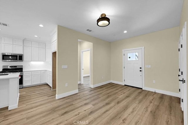 5350 Filbert St, Paradise, CA 95969 - entryway featuring light wood-type flooring and recessed lighting