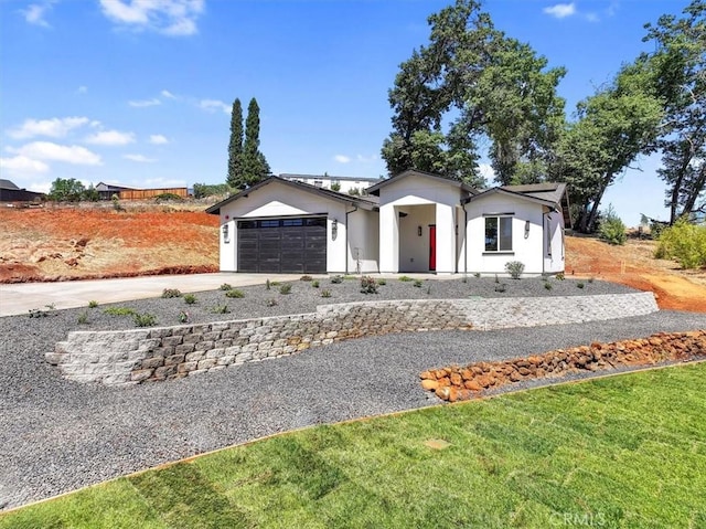 5350 Filbert St, Paradise, CA 95969 - ranch-style house featuring an attached garage, driveway, and stucco siding