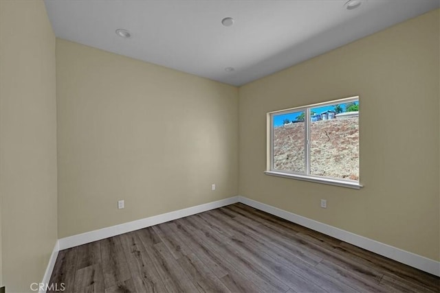 5350 Filbert St, Paradise, CA 95969 - spare room featuring wood finished floors and recessed lighting