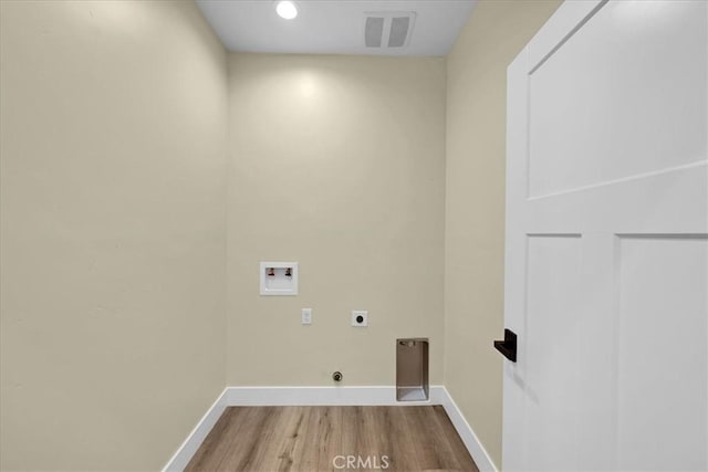 5350 Filbert St, Paradise, CA 95969 - laundry room featuring washer hookup, hookup for an electric dryer, wood finished floors, and recessed lighting