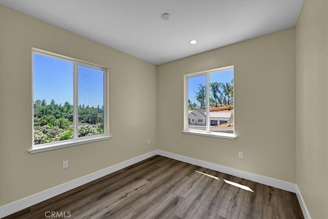 5350 Filbert St, Paradise, CA 95969 - spare room with healthy amount of natural light, wood finished floors, and recessed lighting
