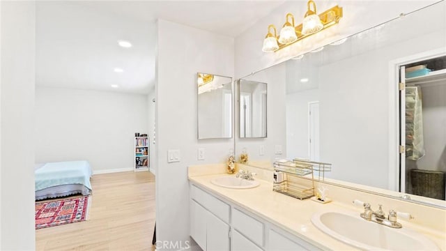 23208 Cuervo Dr, Valencia, CA 91354 - full bath featuring double vanity, wood finished floors, and recessed lighting